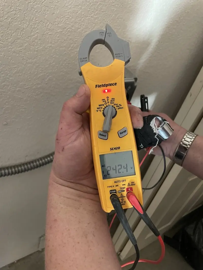 Voltage testing with clamp meter during Generator Installation in Wahneta